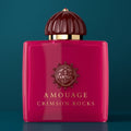 Crimson Elegance (Magenta Amouage bottle against teal)