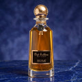 Celestial Gold (Golden-amber liquid with spherical bird-motif cap)